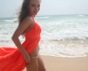 Splendid Russian honey Lena taunting herself on the beach